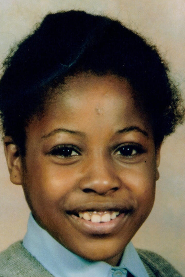 Photo of Black schoolgirl in school uniform